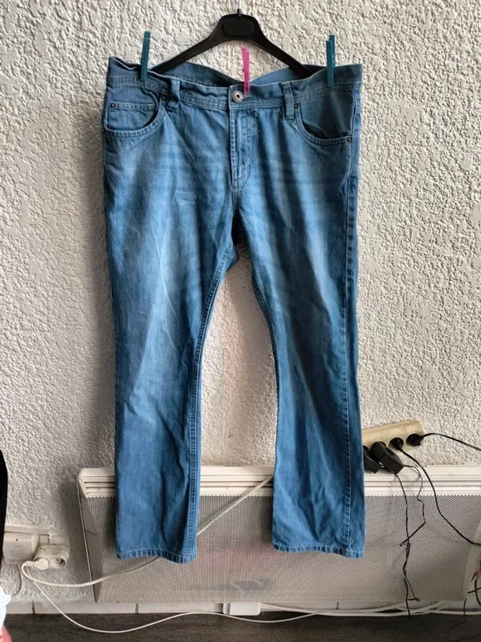 Jean bleu avec bouton t48 - photo numéro 2