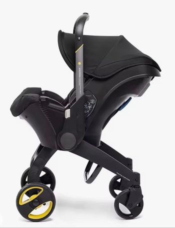 Poussette/ siège-auto doona + base isofix - photo numéro 3