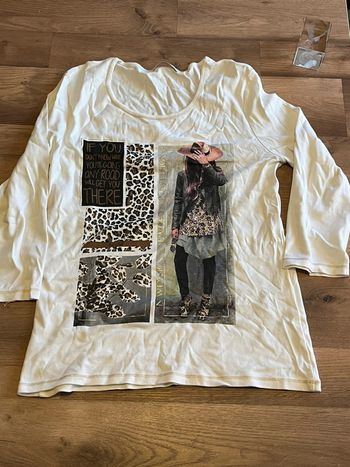 Je vend un haut manche longueur femme taille 3 très bon état