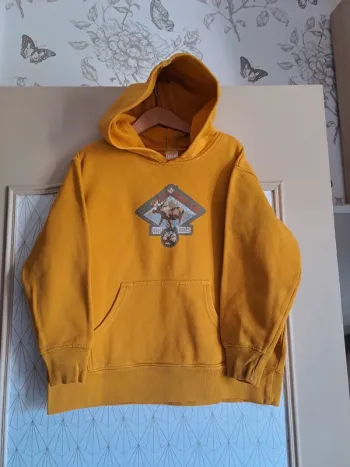 Sweat garçon jaune tks 8-10 ans dessin craquelé micro accroc