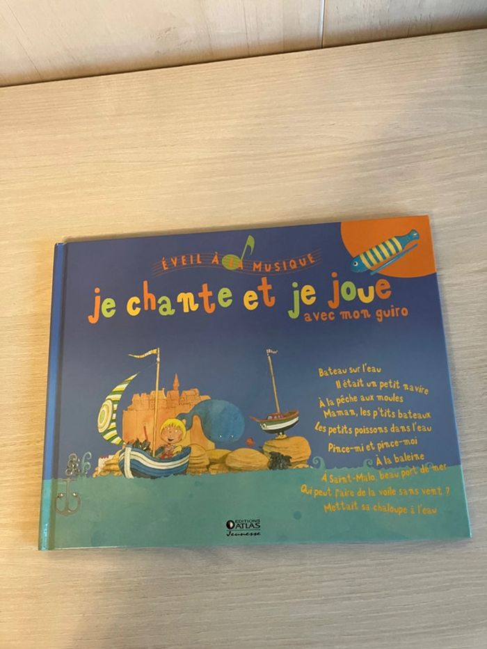Livre enfant "Je chante et je joue avec mon guiro – très bon état – Atlas Jeunesse – éveil musical