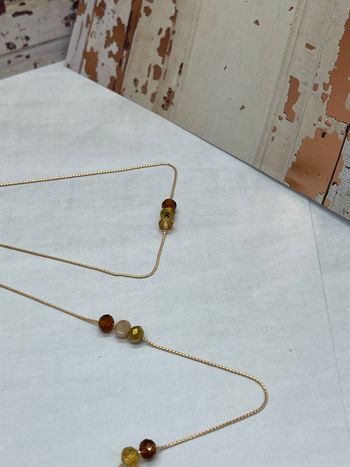 Colliers dos nu en perles cristal beige marron doré