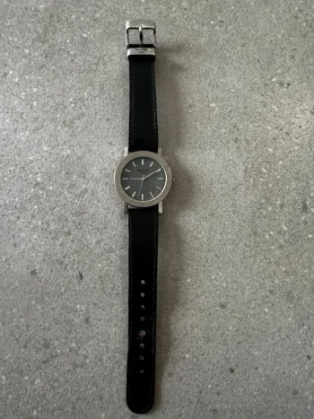 Montre Drakkar, quelques marques d'usures, pile à changer,