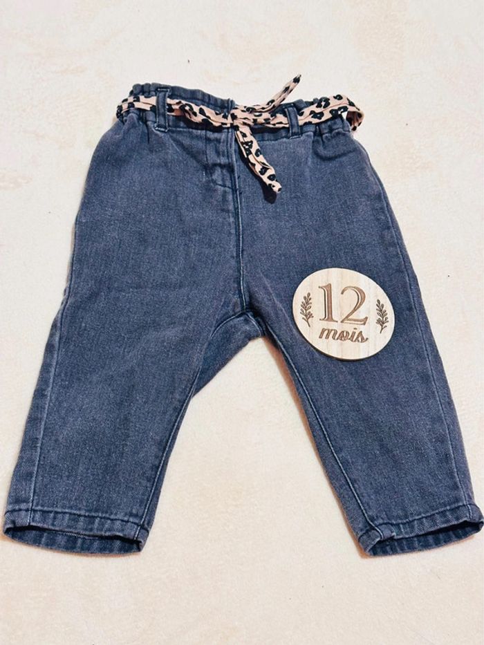 Jean noir avec ceinture léopard