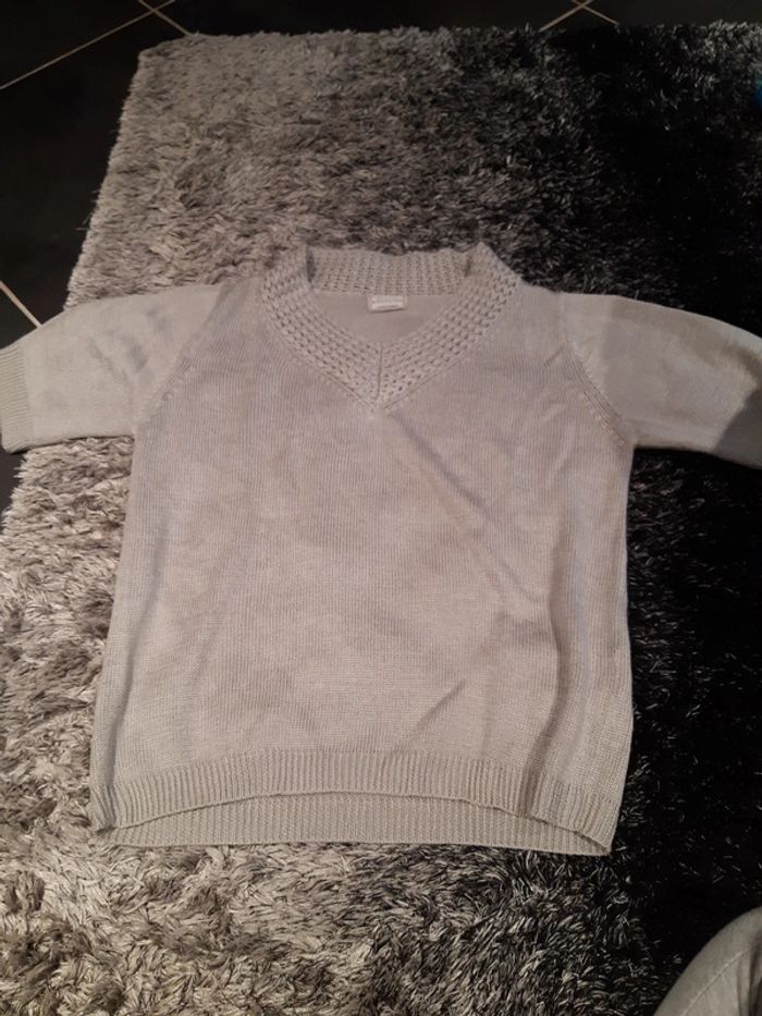 Vends pull sans manches