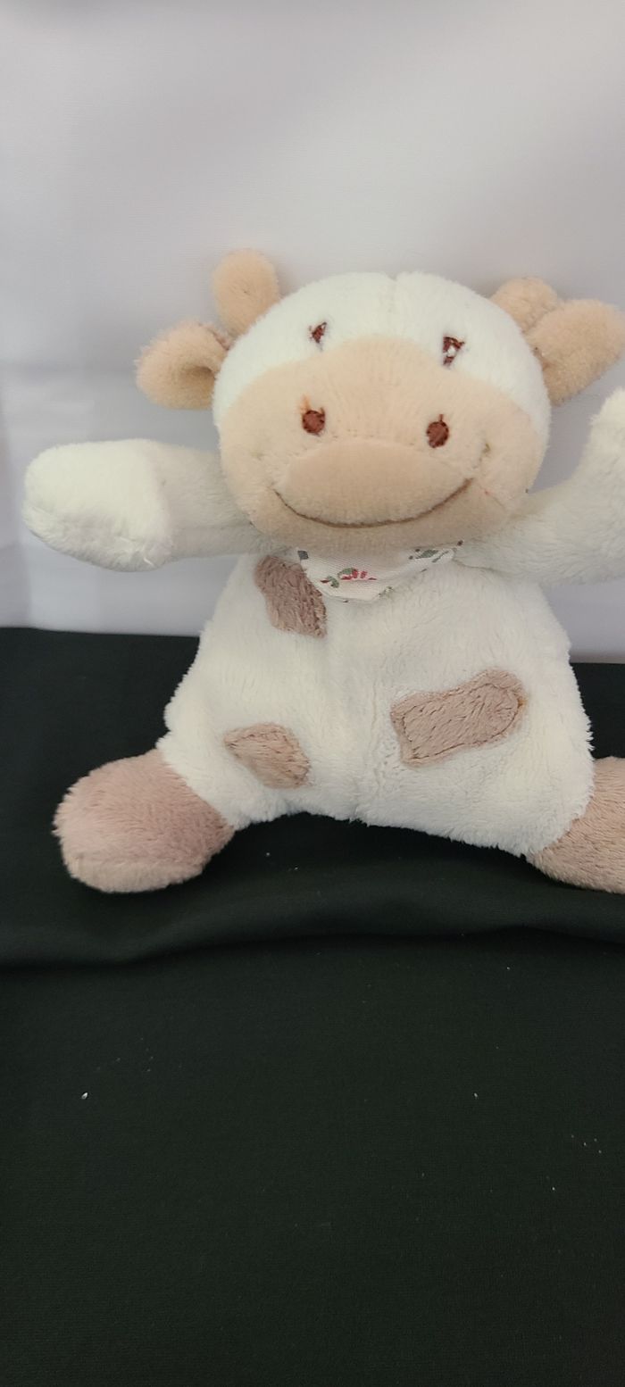 Mini Doudou vache daisy blanche tachetée JOLLYBABY 15 cm