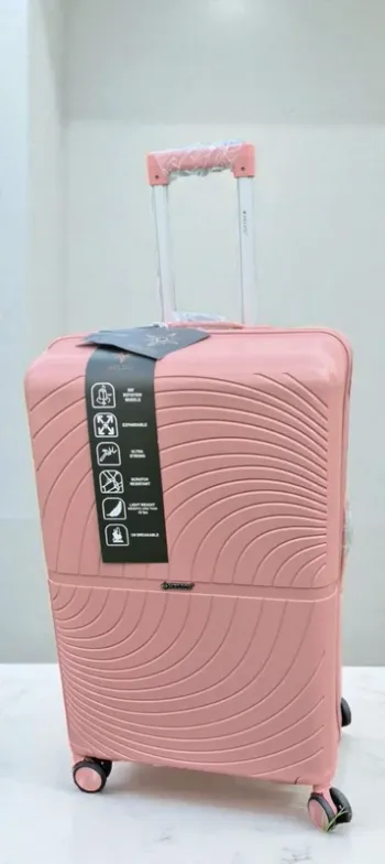 Grande valise rose pâle incassable neuve