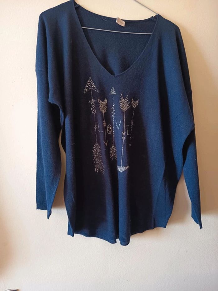 Pull léger manches mi longues. Marque version feminin.