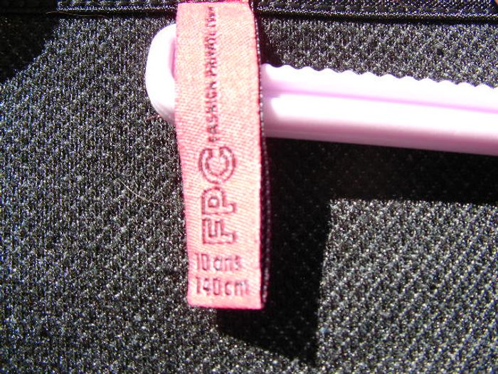 Veste grise et noire 10 ans - photo numéro 3