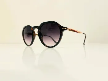 Lunette de soleil mixte marron léopard bras dorés uvprotection catégorie 3
