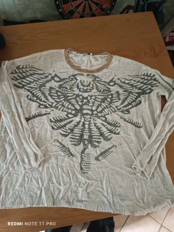 Pull large une saison à Paris taille 42