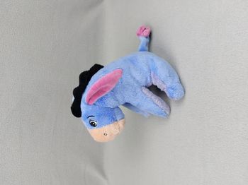 Doudou peluche Bourriquet 20 cm bleu rose mauve DISNEY NICOTOY Winnie l'ourson