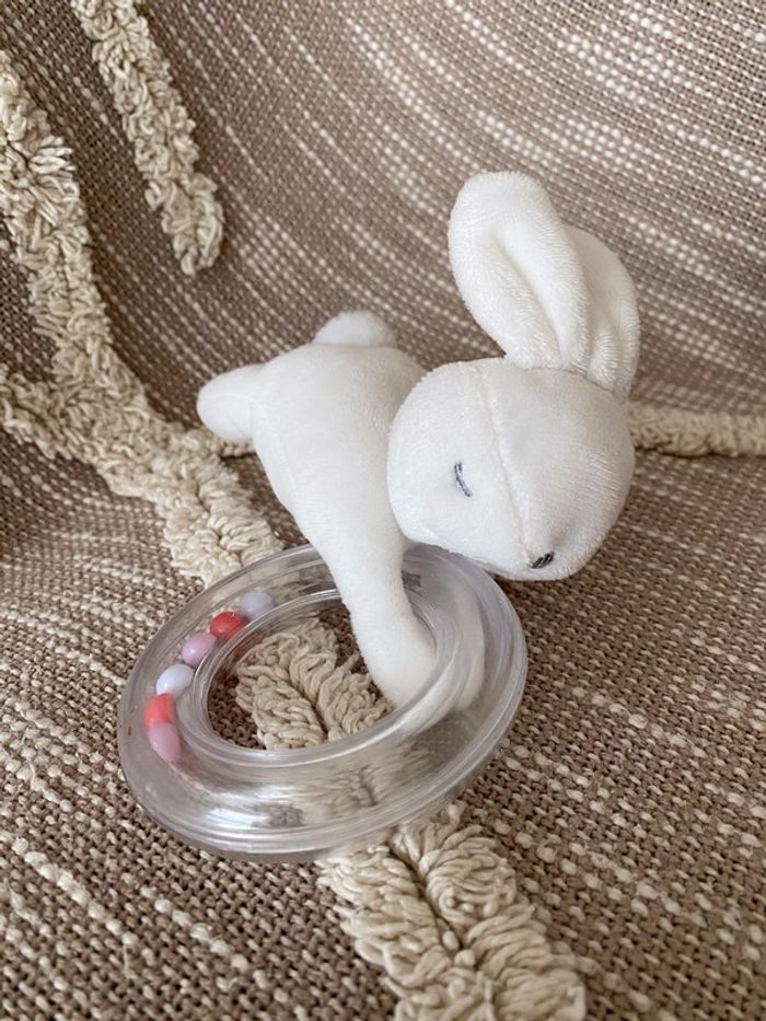 Peluche doudou d’éveil 17cm jacadi lapin blanc anneaux parfait état