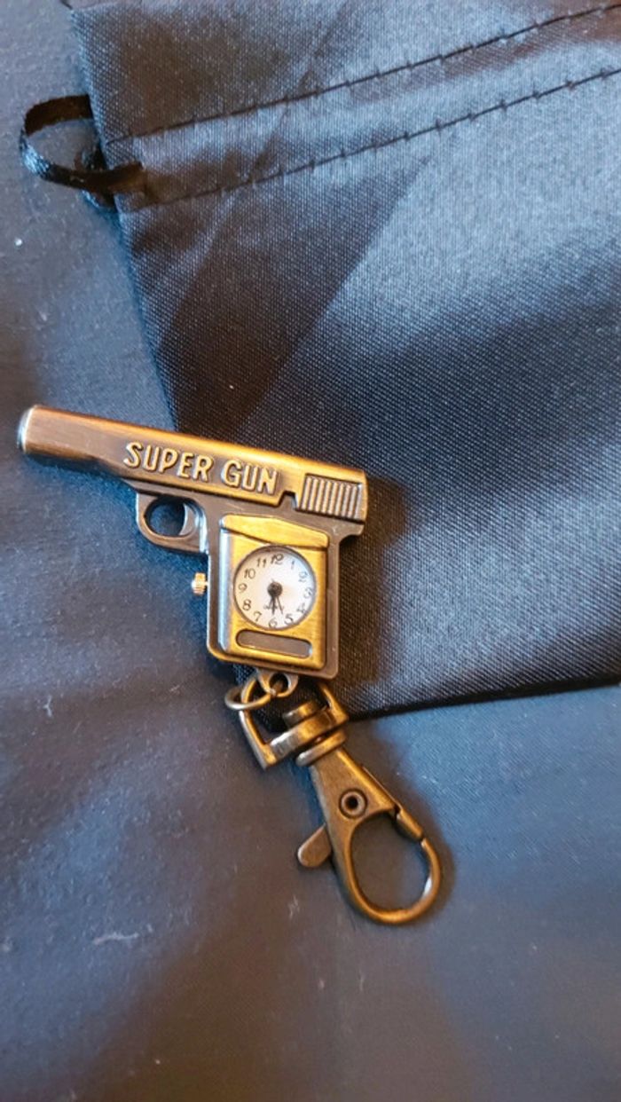 Porte clef montre neuf