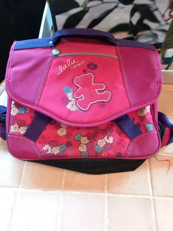 🗑cartable/sac à dos Lulu Castagnette