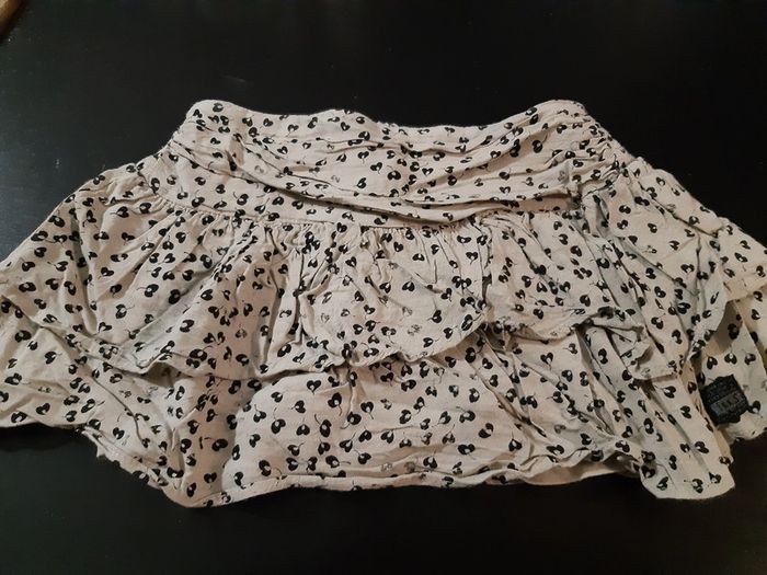 Jupe IKKS beige motif végétal noir 3 ans volants