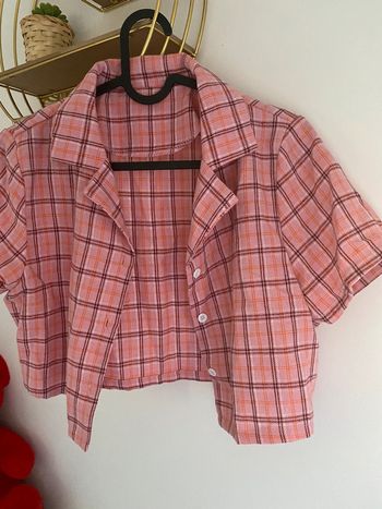 Top sans manches carreaux rose Neuve