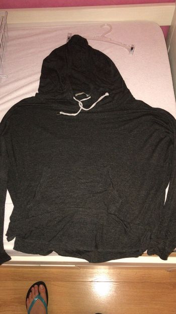 Pull noir en très bon état