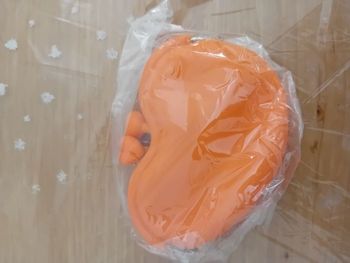 Mini porte monnaie orange  en silicone neuf