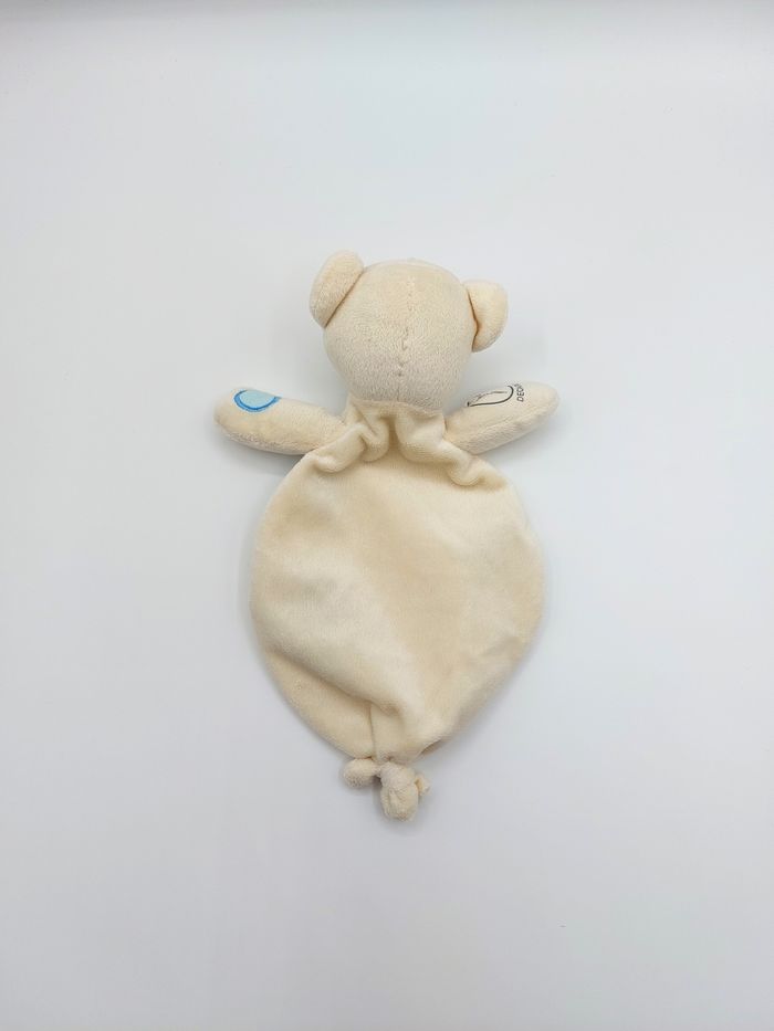 Doudou plat ours écru crème DECAROLI COSFIBEL rond bleu yeux gris - photo numéro 2