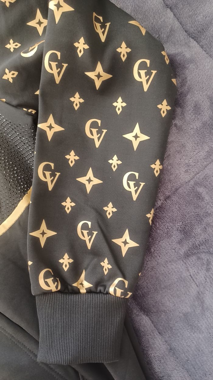 Pull homme noir et doré et noir brillant david&Cooper très bon état xl - photo numéro 3