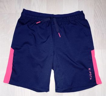 Short en nylon bleu marine et rose fluo Kipsta 
T. 8-9 ans
