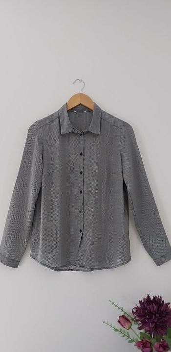 Joli chemisier à motifs noirs et blanc