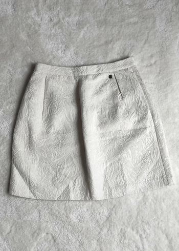 Mini jupe Kaporal blanc crème avec fil métallisé argent taille L