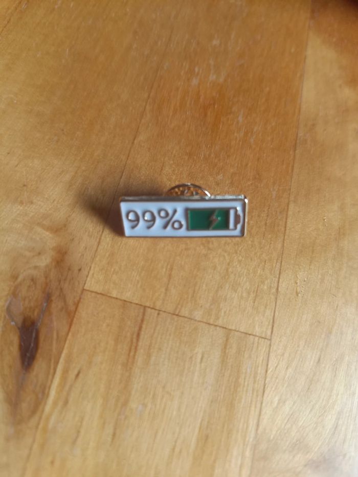 Pin's batterie 99% neuf