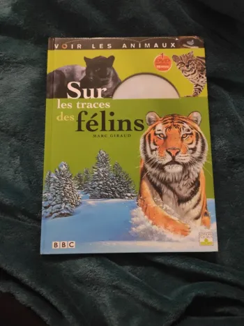 Livre sur les traces des félins