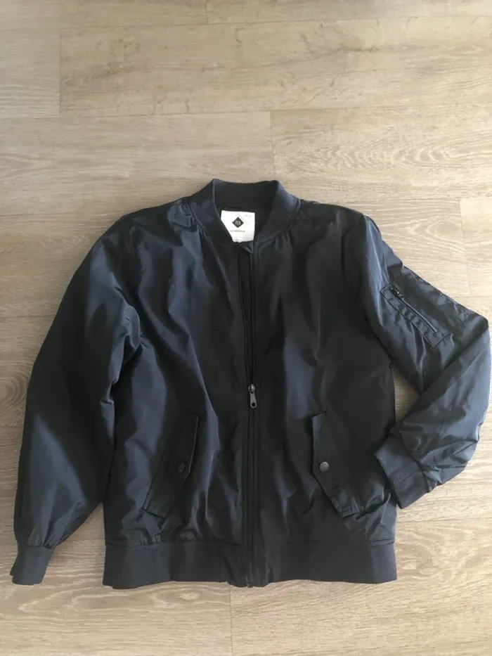 Bombers tex noir taille 11/12 ans excellent état