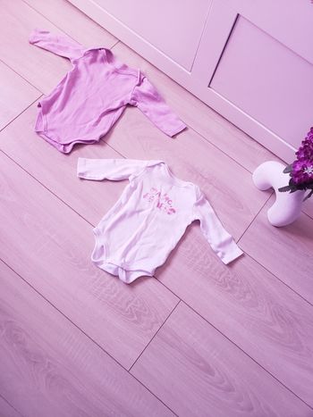 Lo t de 2 bodys 🎀 In Extenso 6 mois 2€