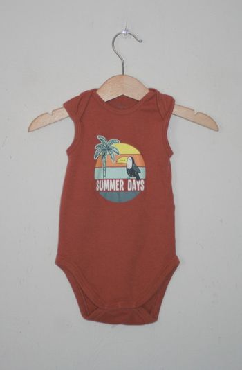 Body sans manche C&A taille 74 (6 à 9 mois)