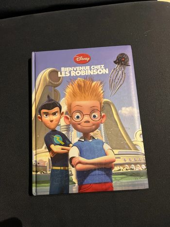 Livre pour enfants Disney couverture matelassé bienvenu chez les robinson