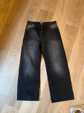 Jean de soirée à paillettes noires