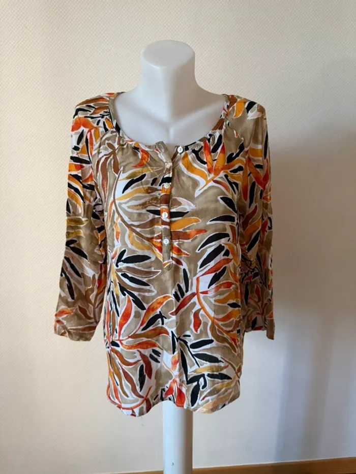 Blouse coloré en très bon état taille 38-40