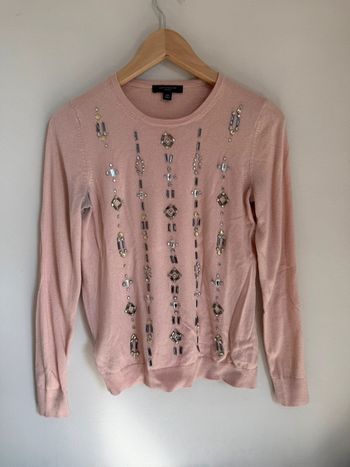 Pull rose à perles
