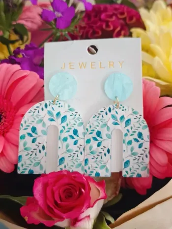 Boucles d'oreilles pont feuillage bleu