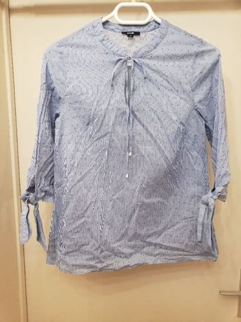 Chemisier légèrement transparent manches 3/4