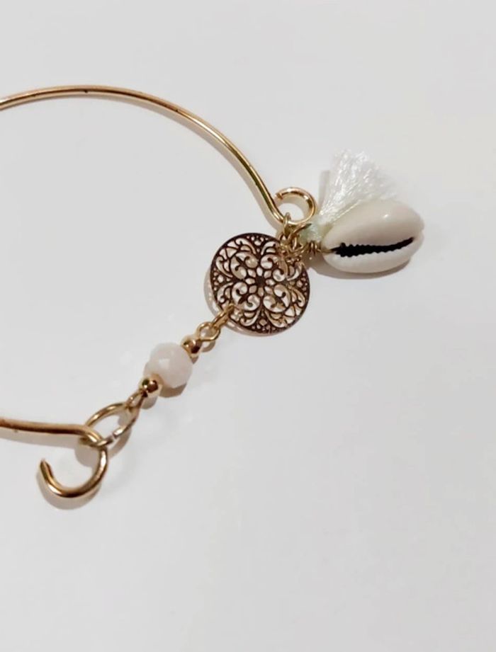 Bracelet jonc dorée coquillage moa - photo numéro 2