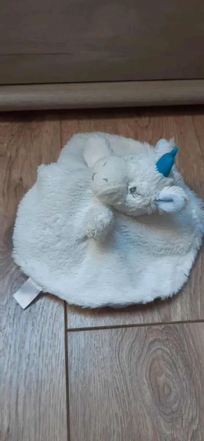 Doudou rond et plat "licorne" blanc/bleu en très bon état - photo numéro 2