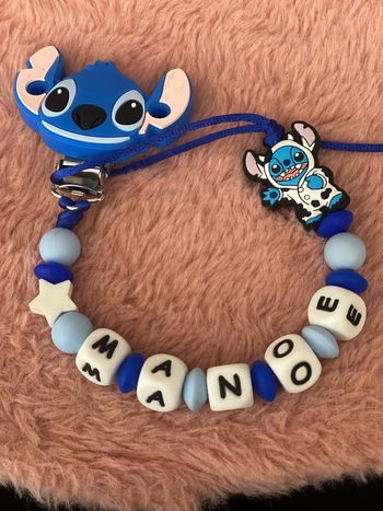 Attache tétine stich