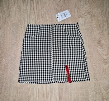 Jupe courte à carreaux pull &bear M neuve