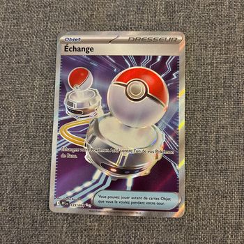 Carte Pokémon Dresseur Échange de Flammes Fantasmagoriques (123/94)