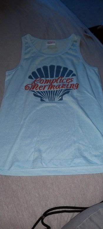 Debardeur neuf 13 14ans taille petit