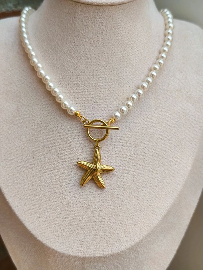Collier en perles blanches et étoile de mer dorée - photo numéro 5