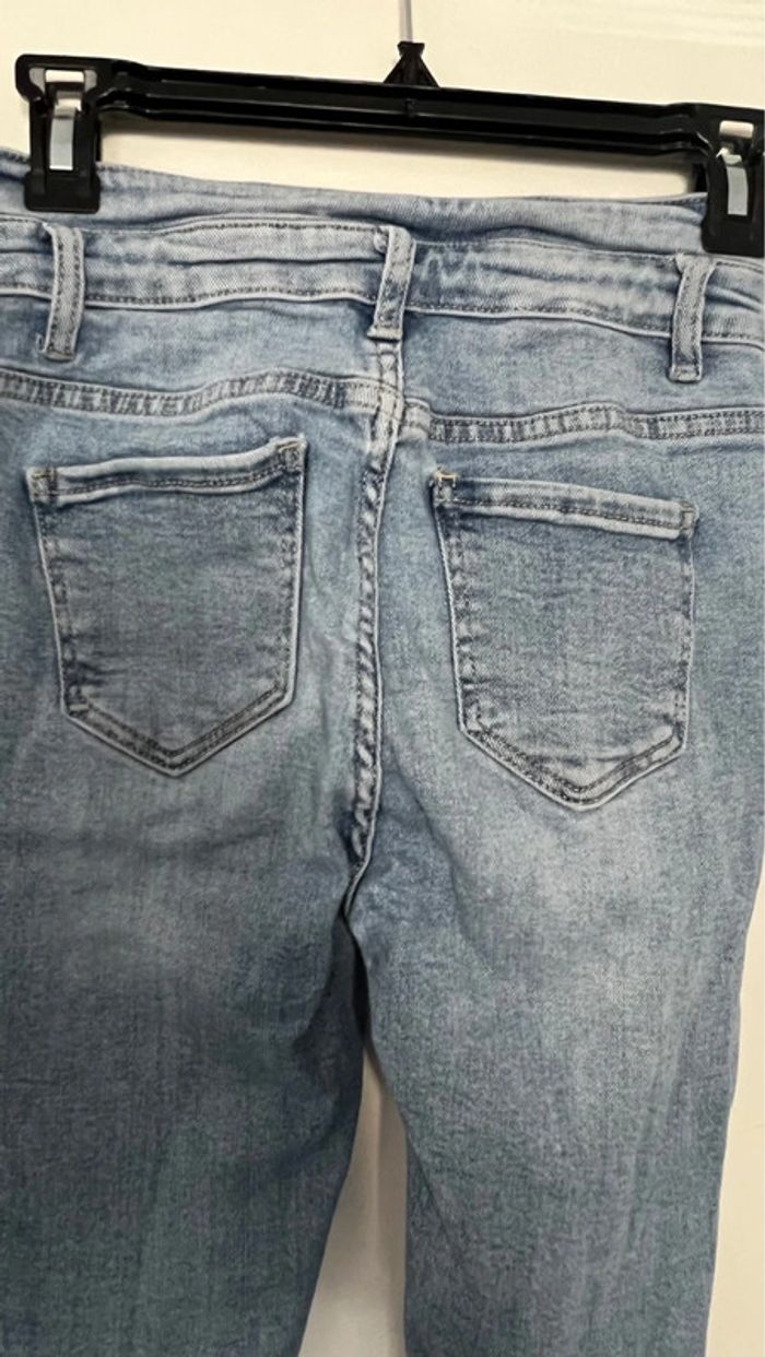 Jean troué taille  haute en parfait état taille M bleu clair - photo numéro 8
