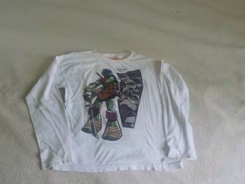 T . shirt , T . 10 ans