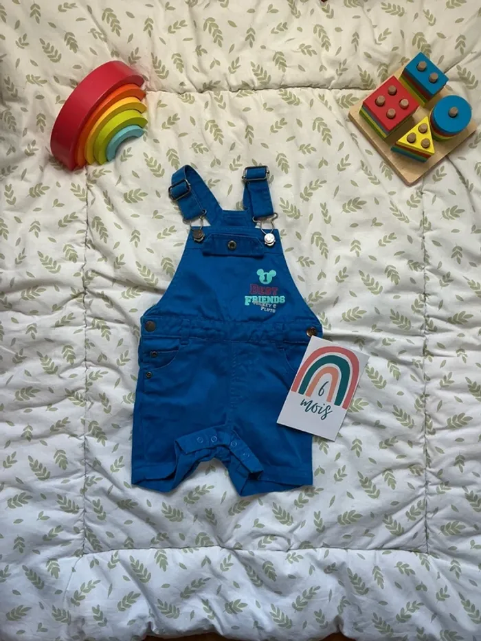 salopette short bleu 6 mois disney pressions entre les jambes