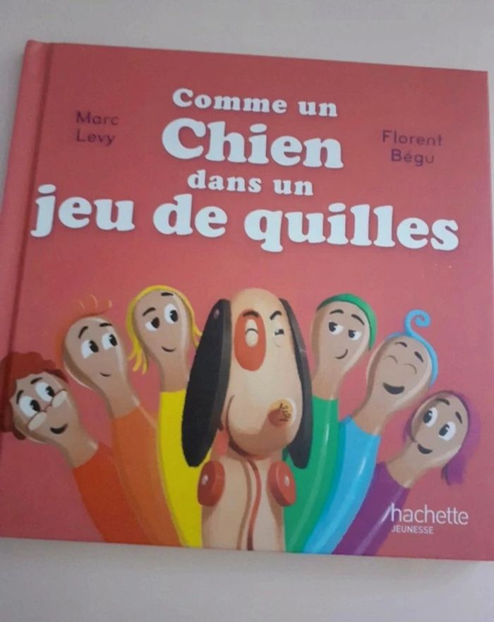 Livre Comme un chien dans un jeu de quilles